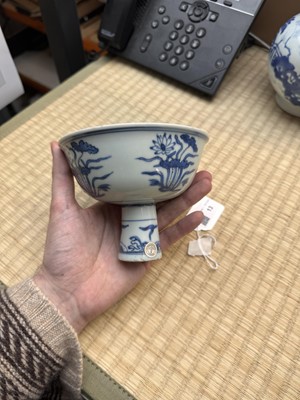 Lot 13 - A fine Chinese blue and white 'lotus bouquet' stem bowl, Ming dynasty, Jiajing / Longqing period
