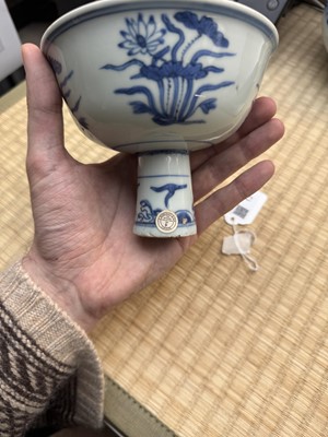 Lot 13 - A fine Chinese blue and white 'lotus bouquet' stem bowl, Ming dynasty, Jiajing / Longqing period