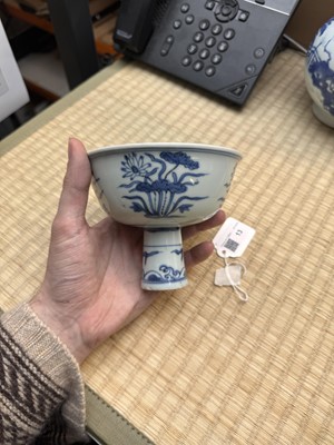 Lot 13 - A fine Chinese blue and white 'lotus bouquet' stem bowl, Ming dynasty, Jiajing / Longqing period