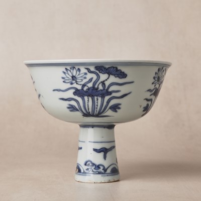 Lot 13 - A fine Chinese blue and white 'lotus bouquet' stem bowl, Ming dynasty, Jiajing / Longqing period