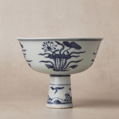 Lot 13 - A fine Chinese blue and white 'lotus bouquet' stem bowl, Ming dynasty, Jiajing / Longqing period