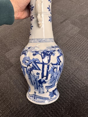 Lot 21 - A rare Chinese blue and white 'Yuanyang Tao' twin-handled vase, Qing dynasty, Kangxi period