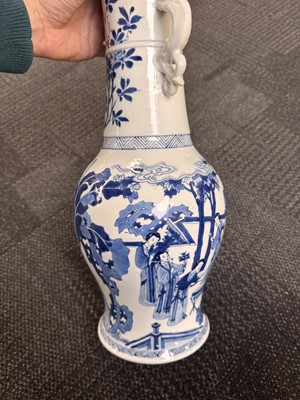 Lot 21 - A rare Chinese blue and white 'Yuanyang Tao' twin-handled vase, Qing dynasty, Kangxi period