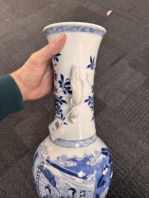 Lot 21 - A rare Chinese blue and white 'Yuanyang Tao' twin-handled vase, Qing dynasty, Kangxi period