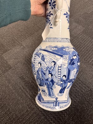 Lot 21 - A rare Chinese blue and white 'Yuanyang Tao' twin-handled vase, Qing dynasty, Kangxi period