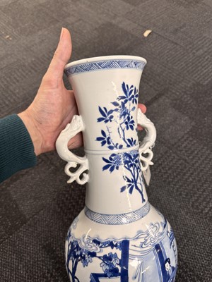 Lot 21 - A rare Chinese blue and white 'Yuanyang Tao' twin-handled vase, Qing dynasty, Kangxi period