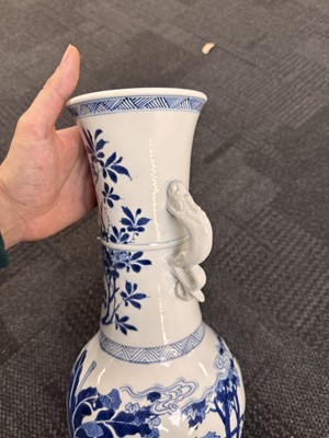 Lot 21 - A rare Chinese blue and white 'Yuanyang Tao' twin-handled vase, Qing dynasty, Kangxi period
