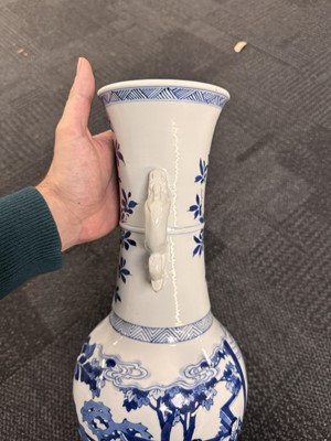 Lot 21 - A rare Chinese blue and white 'Yuanyang Tao' twin-handled vase, Qing dynasty, Kangxi period
