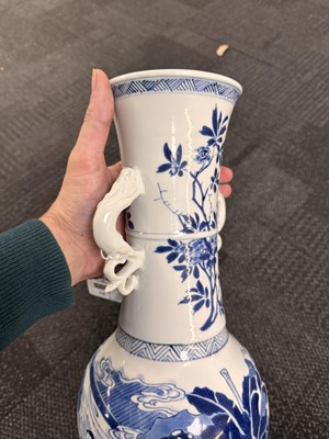 Lot 21 - A rare Chinese blue and white 'Yuanyang Tao' twin-handled vase, Qing dynasty, Kangxi period