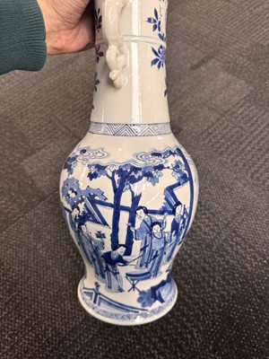 Lot 21 - A rare Chinese blue and white 'Yuanyang Tao' twin-handled vase, Qing dynasty, Kangxi period