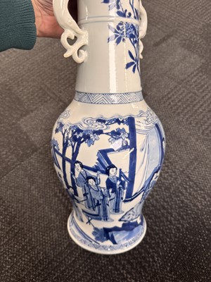 Lot 21 - A rare Chinese blue and white 'Yuanyang Tao' twin-handled vase, Qing dynasty, Kangxi period