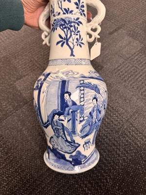 Lot 21 - A rare Chinese blue and white 'Yuanyang Tao' twin-handled vase, Qing dynasty, Kangxi period