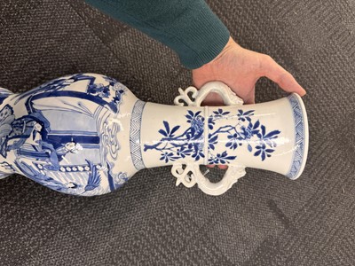 Lot 21 - A rare Chinese blue and white 'Yuanyang Tao' twin-handled vase, Qing dynasty, Kangxi period