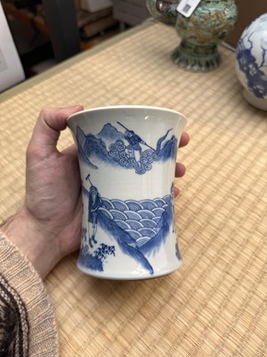 Lot 23 - A Chinese blue and white 'Journey to the West' brush pot, Qing dynasty, Guangxu period