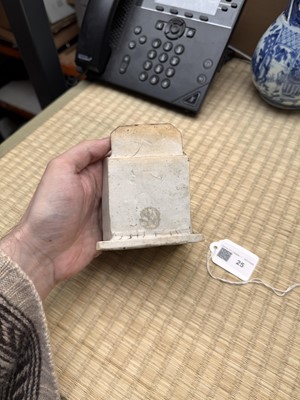 Lot 25 - A Chinese sancai-glazed biscuit 'love scene' brush holder, Qing dynasty, Kangxi period, circa 1690