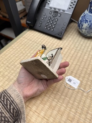 Lot 25 - A Chinese sancai-glazed biscuit 'love scene' brush holder, Qing dynasty, Kangxi period, circa 1690