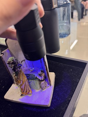 Lot 25 - A Chinese sancai-glazed biscuit 'love scene' brush holder, Qing dynasty, Kangxi period, circa 1690