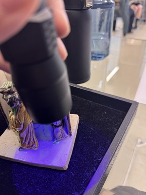 Lot 25 - A Chinese sancai-glazed biscuit 'love scene' brush holder, Qing dynasty, Kangxi period, circa 1690