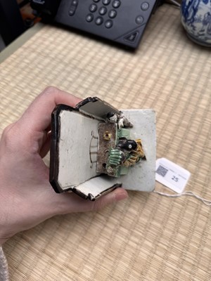 Lot 25 - A Chinese sancai-glazed biscuit 'love scene' brush holder, Qing dynasty, Kangxi period, circa 1690