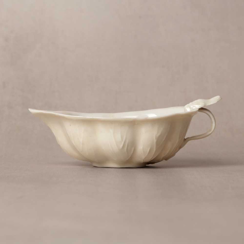 Lot 33 - A fine Chinese Dehua 'lotus' brush washer, Qing dynasty, Kangxi period