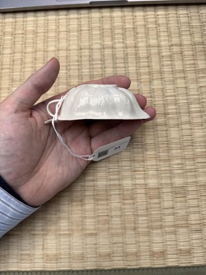 Lot 33 - A fine Chinese Dehua 'lotus' brush washer, Qing dynasty, Kangxi period