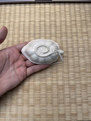 Lot 33 - A fine Chinese Dehua 'lotus' brush washer, Qing dynasty, Kangxi period