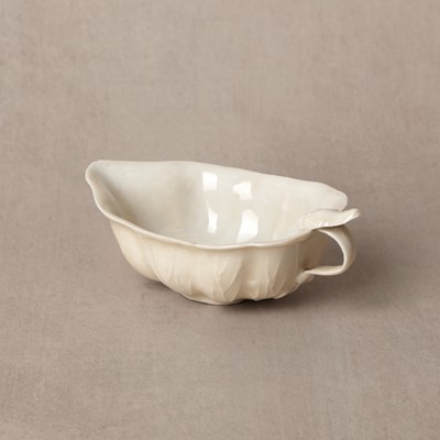 Lot 33 - A fine Chinese Dehua 'lotus' brush washer, Qing dynasty, Kangxi period