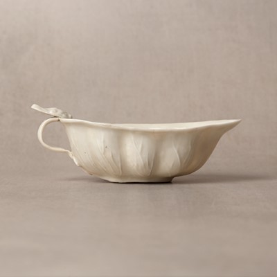 Lot 33 - A fine Chinese Dehua 'lotus' brush washer, Qing dynasty, Kangxi period