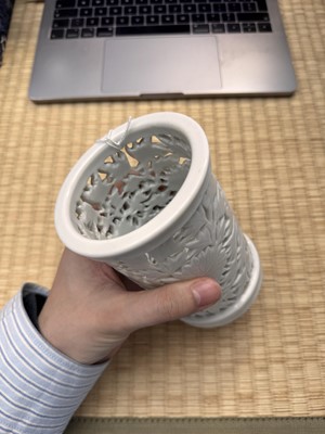 Lot 31 - A fine Chinese Dehua reticulated 'peony' brush pot, bitong, Qing dynasty, Kangxi period