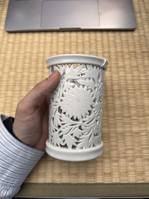 Lot 31 - A fine Chinese Dehua reticulated 'peony' brush pot, bitong, Qing dynasty, Kangxi period