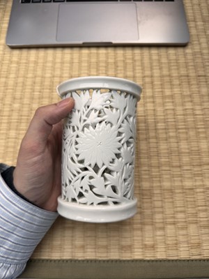 Lot 31 - A fine Chinese Dehua reticulated 'peony' brush pot, bitong, Qing dynasty, Kangxi period