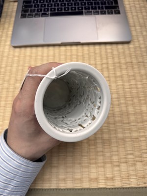 Lot 31 - A fine Chinese Dehua reticulated 'peony' brush pot, bitong, Qing dynasty, Kangxi period