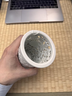 Lot 31 - A fine Chinese Dehua reticulated 'peony' brush pot, bitong, Qing dynasty, Kangxi period