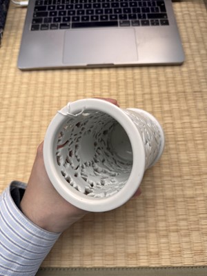 Lot 31 - A fine Chinese Dehua reticulated 'peony' brush pot, bitong, Qing dynasty, Kangxi period