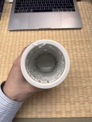 Lot 31 - A fine Chinese Dehua reticulated 'peony' brush pot, bitong, Qing dynasty, Kangxi period