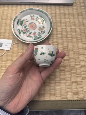 Lot 24 - A fine Chinese famille-verte tasse trembleuse, Qing dynasty, Kangxi period
