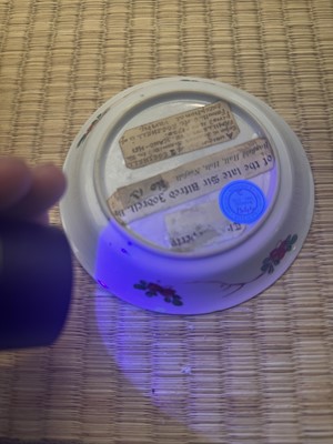 Lot 24 - A fine Chinese famille-verte tasse trembleuse, Qing dynasty, Kangxi period