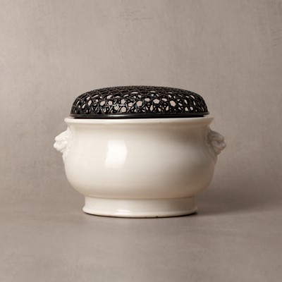 Lot 35 - A Chinese Dehua bombe censer, Qing dynasty, Kangxi period