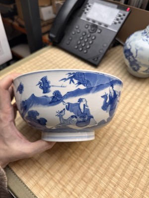 Lot 19 - A fine Chinese blue and white 'scholars and deer' bowl, Qing dynasty, Kangxi mark and period
