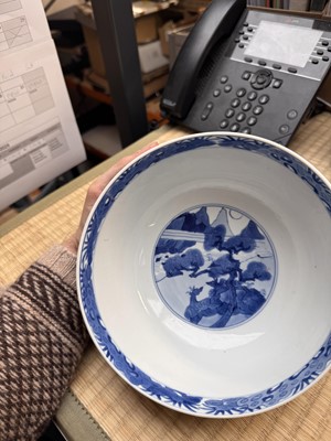 Lot 19 - A fine Chinese blue and white 'scholars and deer' bowl, Qing dynasty, Kangxi mark and period