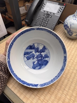 Lot 19 - A fine Chinese blue and white 'scholars and deer' bowl, Qing dynasty, Kangxi mark and period
