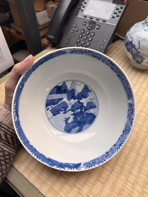 Lot 19 - A fine Chinese blue and white 'scholars and deer' bowl, Qing dynasty, Kangxi mark and period