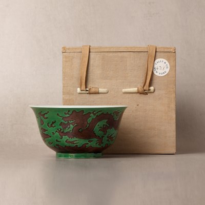Lot A rare Chinese Imperial green-ground aubergine-enamelled 'dragon' bowl, Qing Dynasty, Kangxi mark and of the period