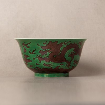 Lot 22 - ♦ A rare Chinese Imperial aubergine-enamelled 'dragon' bowl, Qing dynasty, Kangxi mark and period
