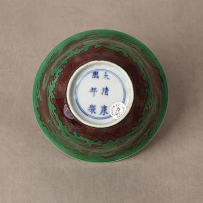 Lot 22 - ♦ A rare Chinese Imperial aubergine-enamelled 'dragon' bowl, Qing dynasty, Kangxi mark and period