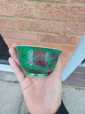 Lot 22 - ♦ A rare Chinese Imperial aubergine-enamelled 'dragon' bowl, Qing dynasty, Kangxi mark and period