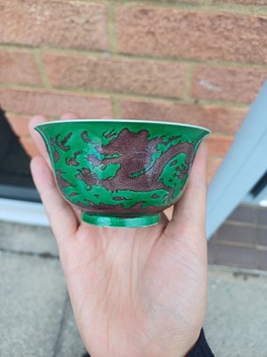 Lot 22 - ♦ A rare Chinese Imperial aubergine-enamelled 'dragon' bowl, Qing dynasty, Kangxi mark and period