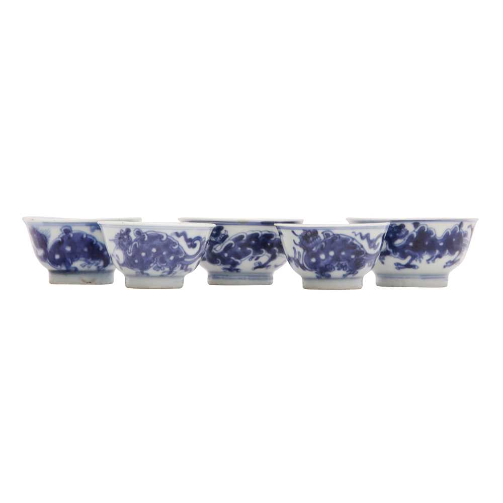 Lot 446 - A group of five Chinese blue and white cups, Qing dynasty, 18th/19th century