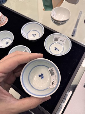 Lot 446 - A group of five Chinese blue and white cups, Qing dynasty, 18th/19th century