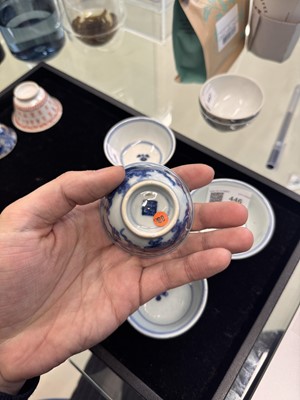 Lot 446 - A group of five Chinese blue and white cups, Qing dynasty, 18th/19th century